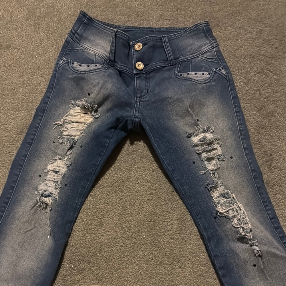Women's Distressed Blue Jeans